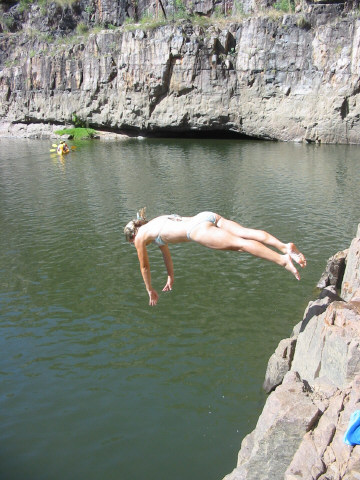 Orla samples the water in Katherine Gorge